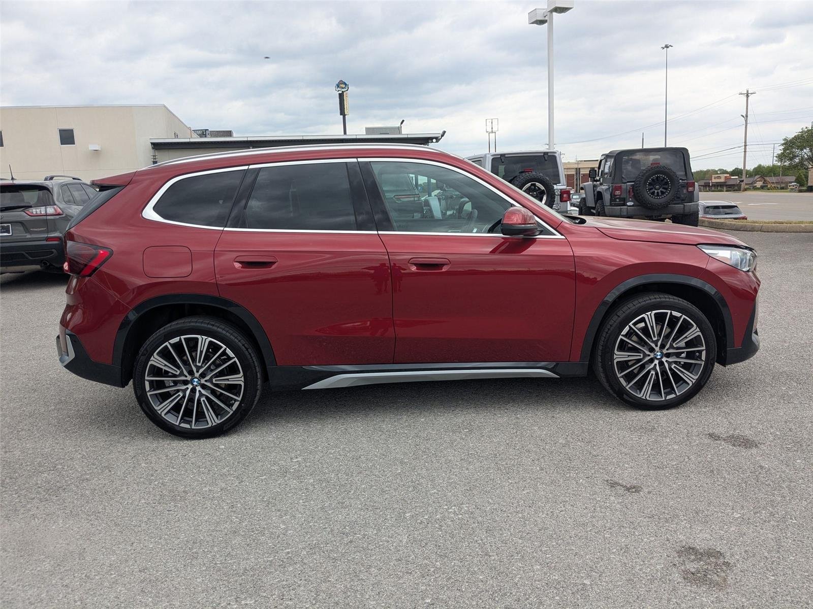 New 2026 Vegas Red Metallic BMW xDrive28i image 4