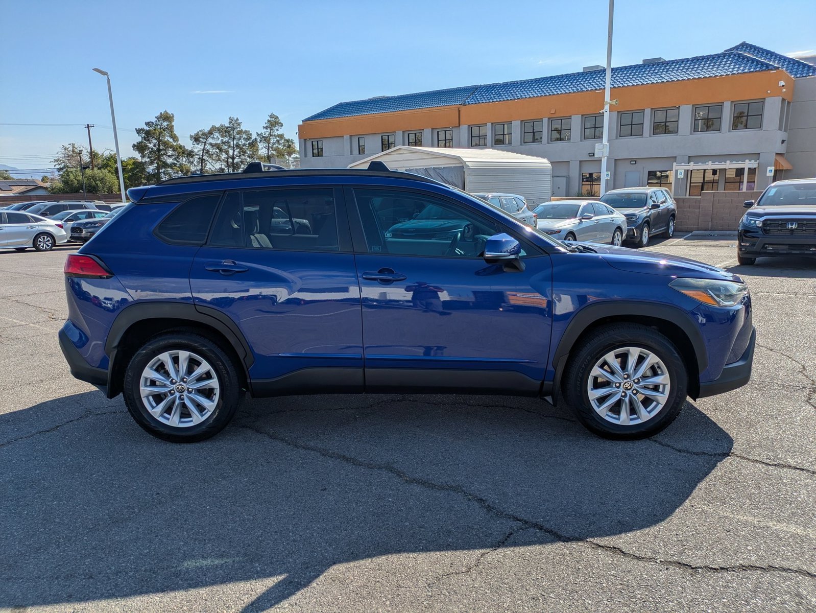 Used 2022 Blue Crush Metallic Toyota LE image 4