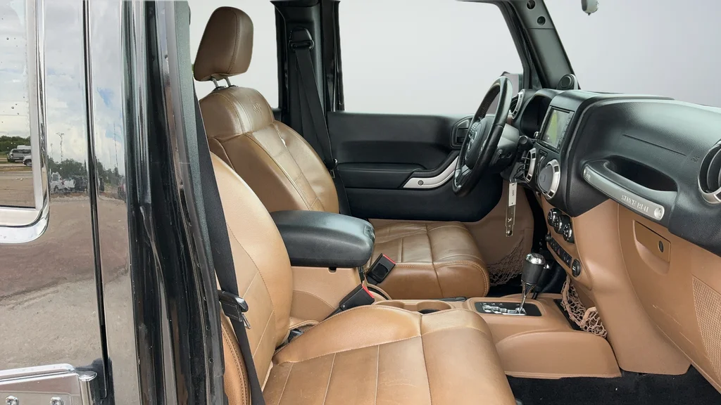 Used 2012 Black Jeep Unlimited Sahara image 21