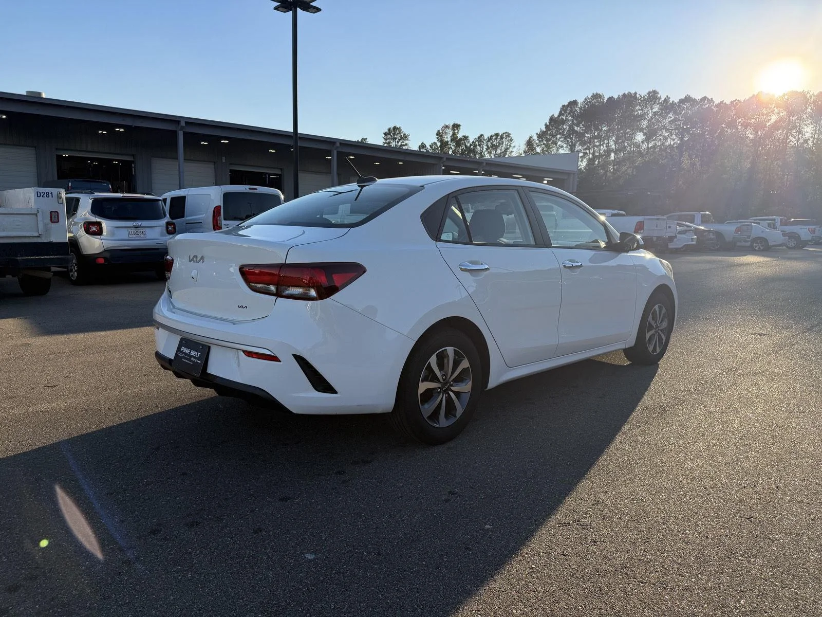 Used 2022 Clear White Kia S image 6