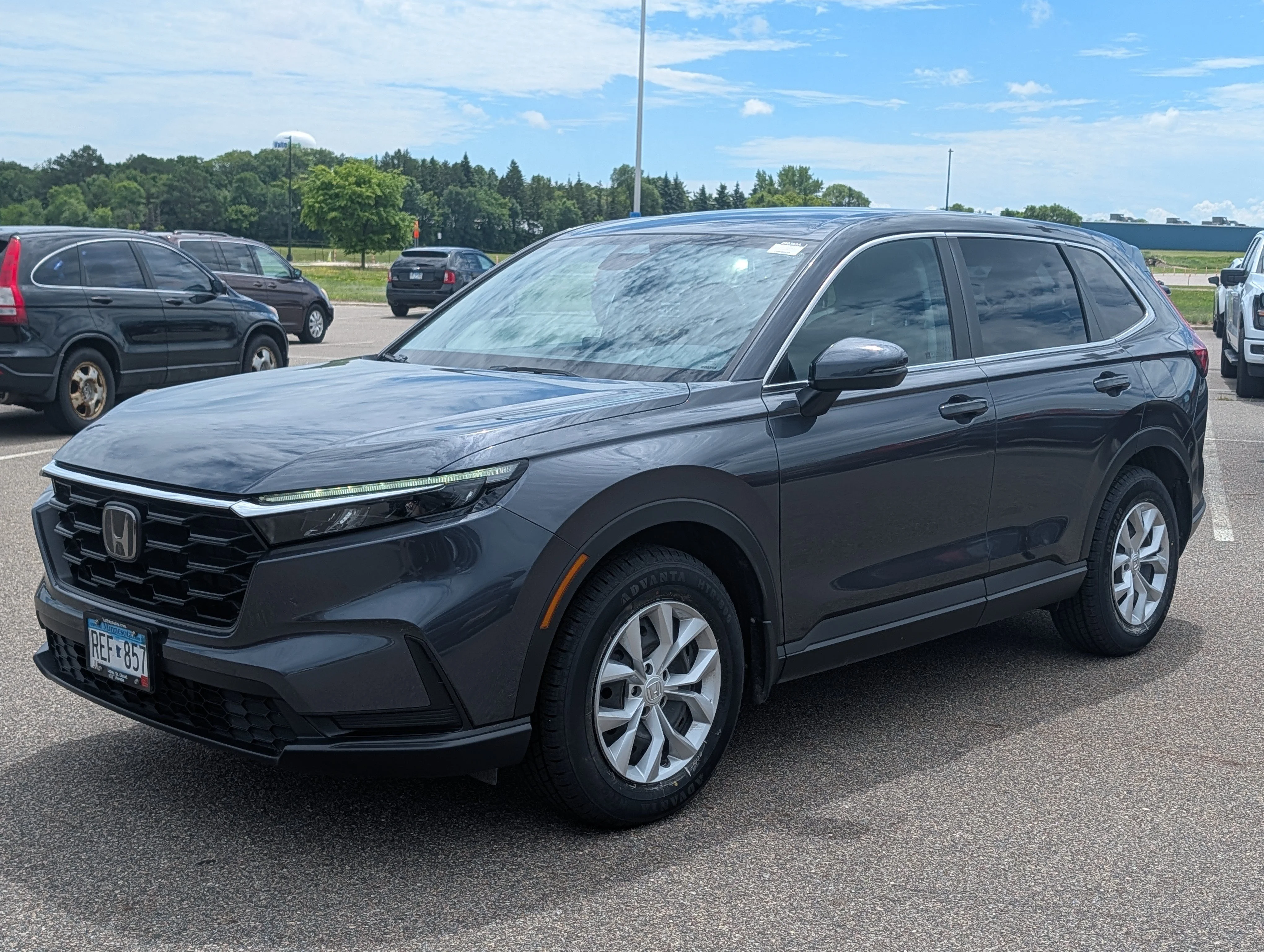 Used 2025 Meteorite Gray Metallic Honda LX image 2