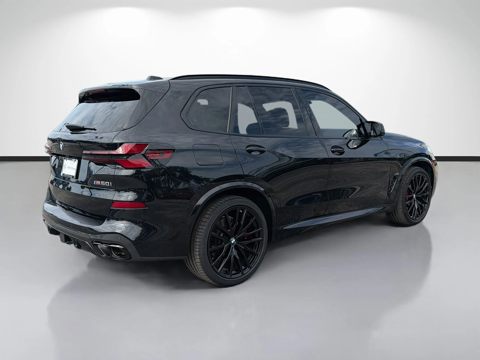 Used 2025 Black Sapphire Metallic BMW M60i image 3