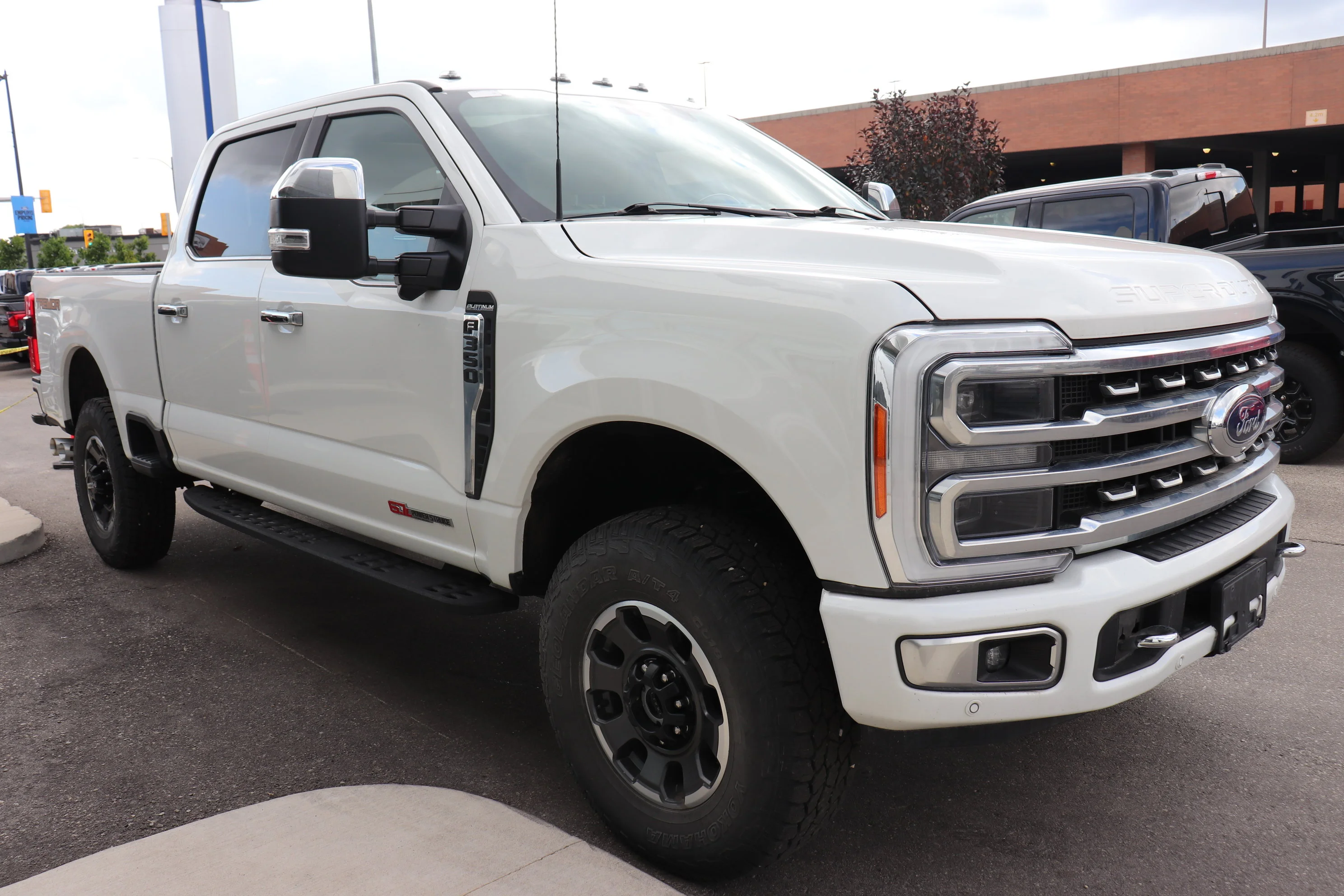 Certified Used 2023 White Ford PLATINUM 4WD Crew Cab 6.75