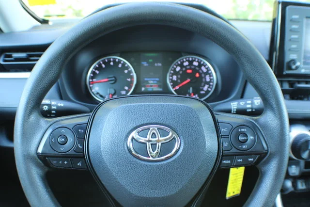 Used 2021 Super White Toyota LE image 8
