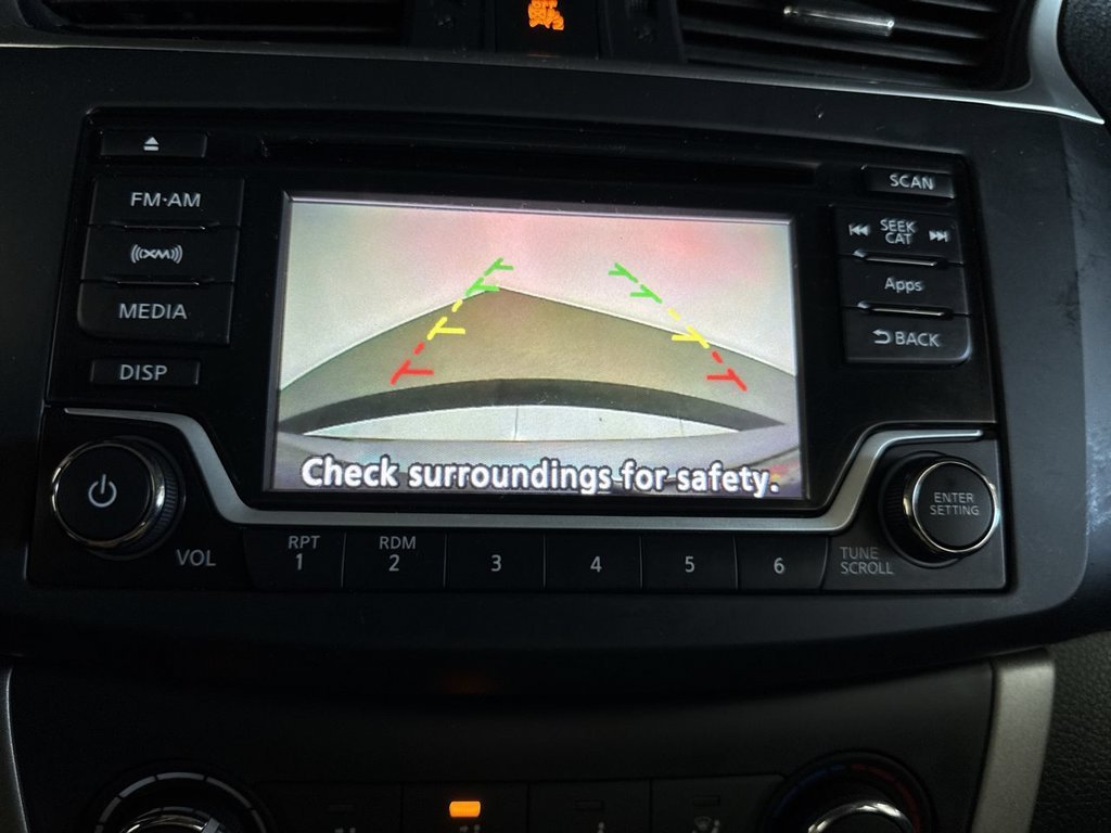 Used 2015 Gun Metallic Nissan SV image 27