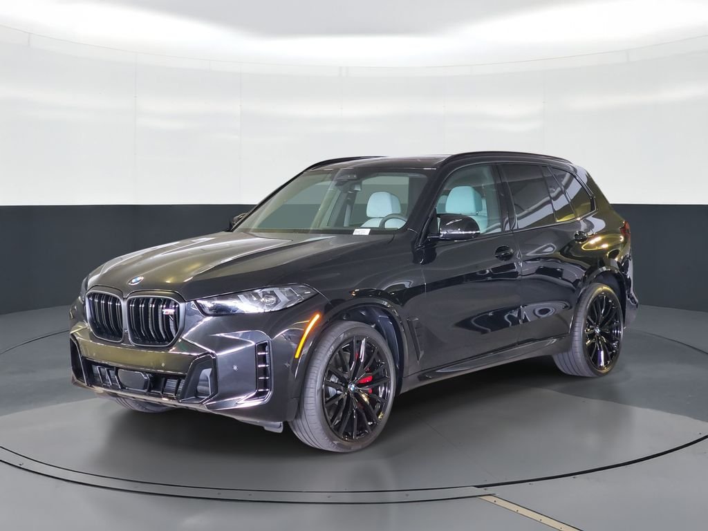New 2026 Black Sapphire Metallic BMW M60i image 1