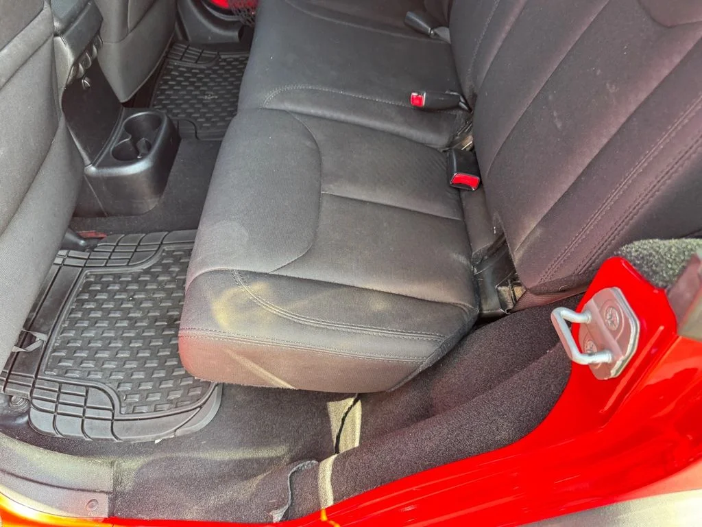 Used 2014 Red Jeep Unlimited Sport image 9