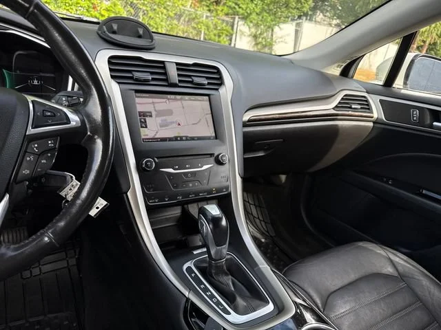 Used 2013 White Platinum Clearcoat Metallic Ford SE Hybrid image 22