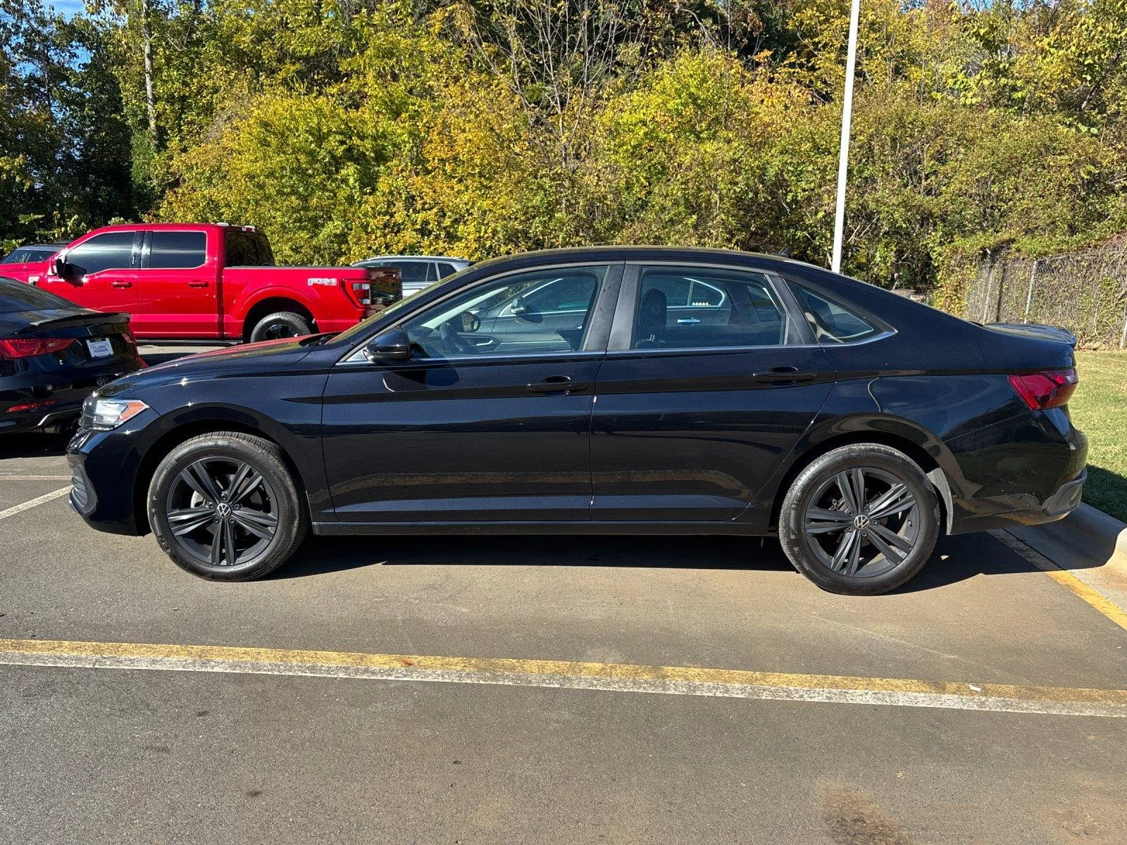 Used 2023 DEEP BLACK VOLKSWAGEN SE image 2