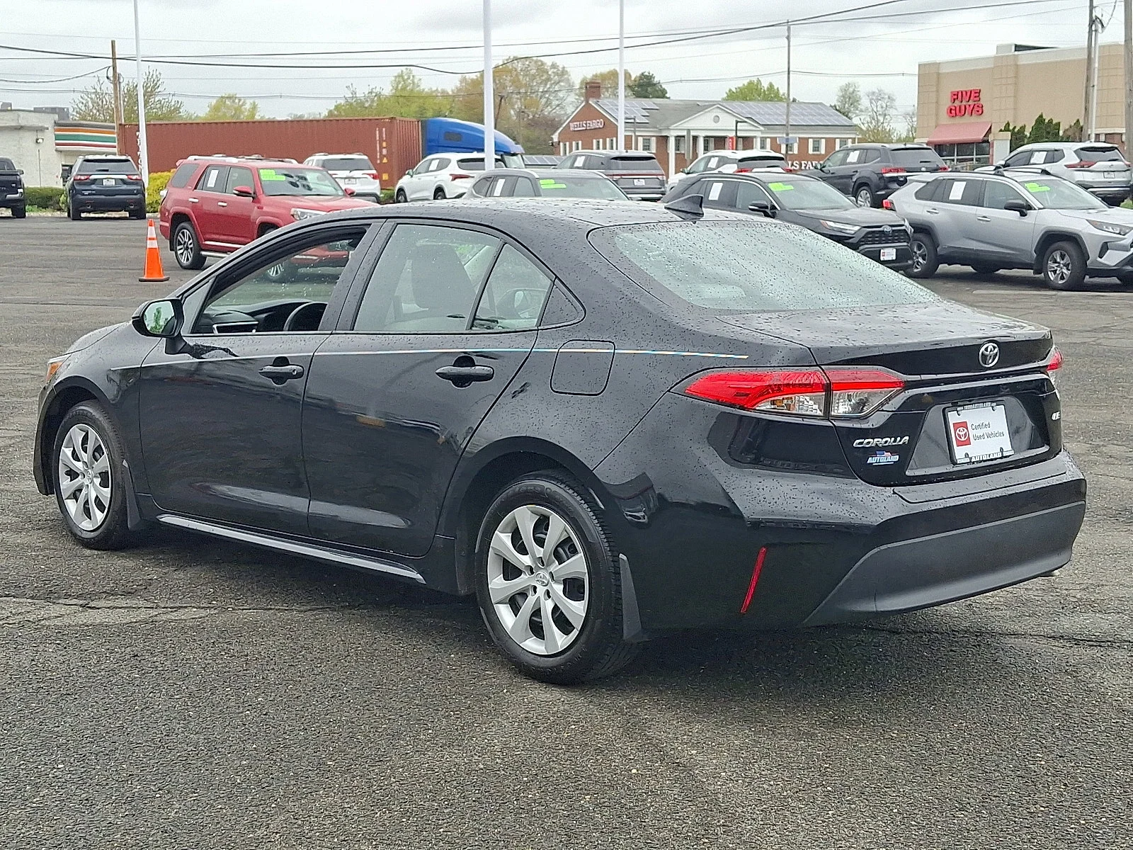 Used 2024 Midnight Black Metallic - 218 Toyota LE image 5