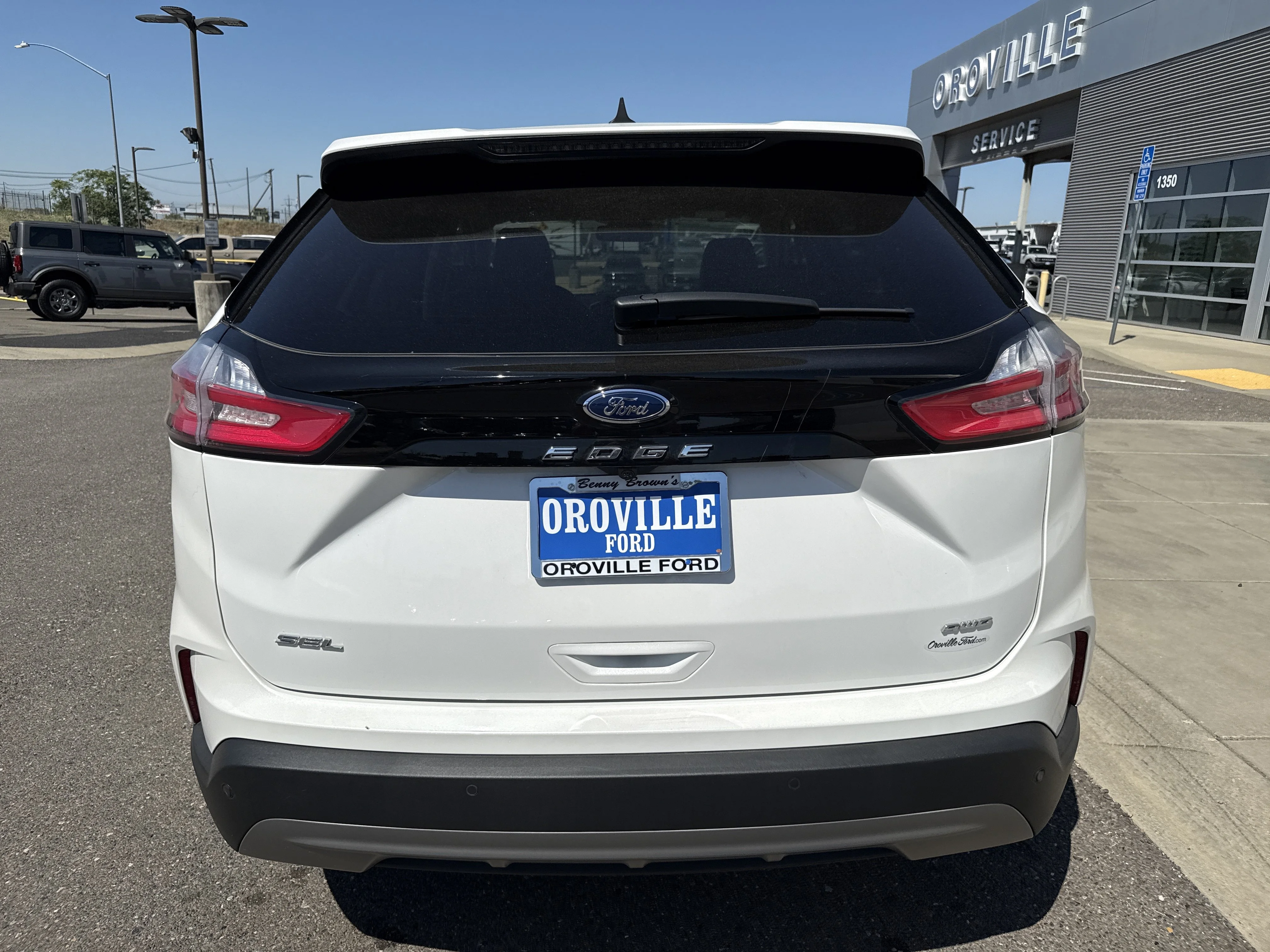 Used 2024 Star White Metallic Tri-Coat Ford SEL image 4