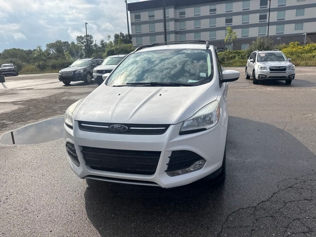 Used 2013 White Platinum Ford SE image 6