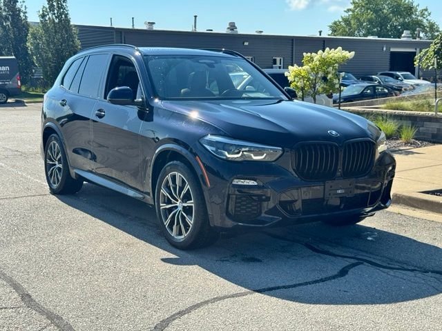 Used 2021 Carbon Black Metallic BMW xDrive40i image 1
