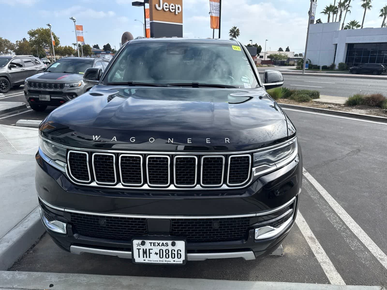 Used 2024 Diamond Black Crystal Pearlcoat Jeep Series II image 4