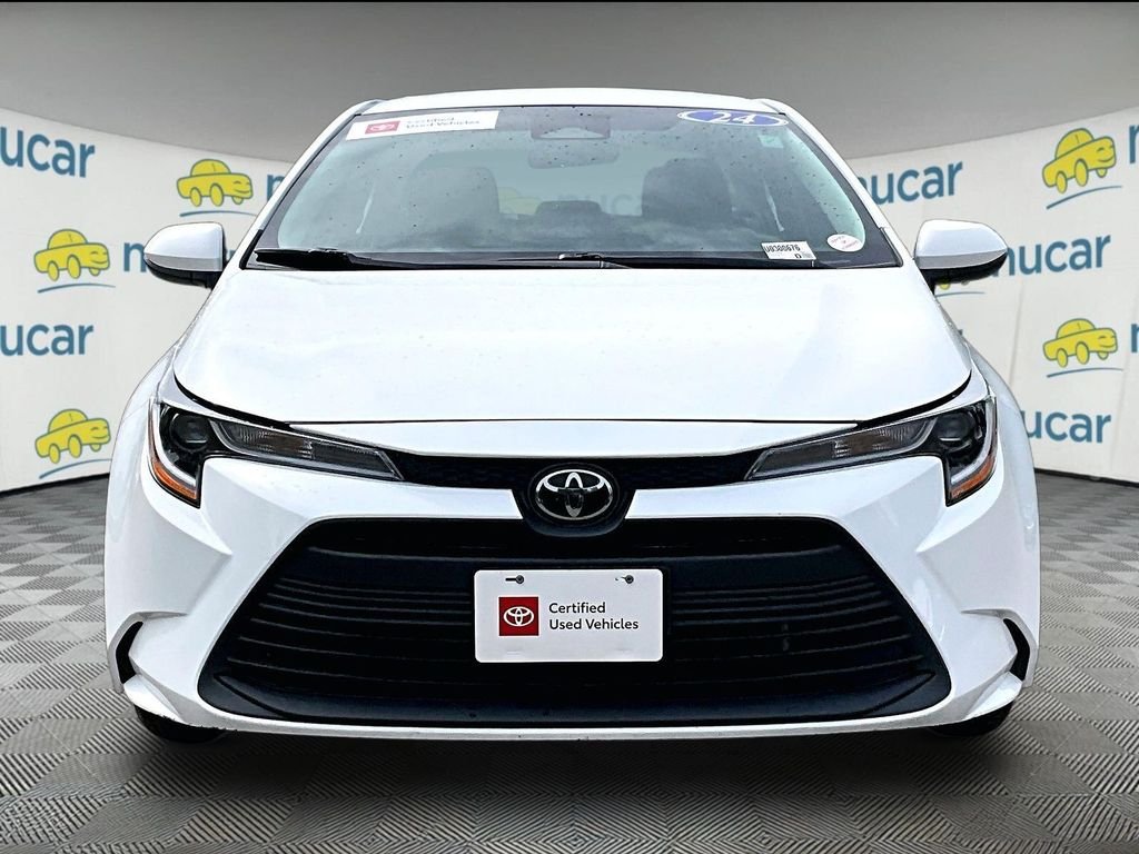 Used 2024 White Toyota LE image 2