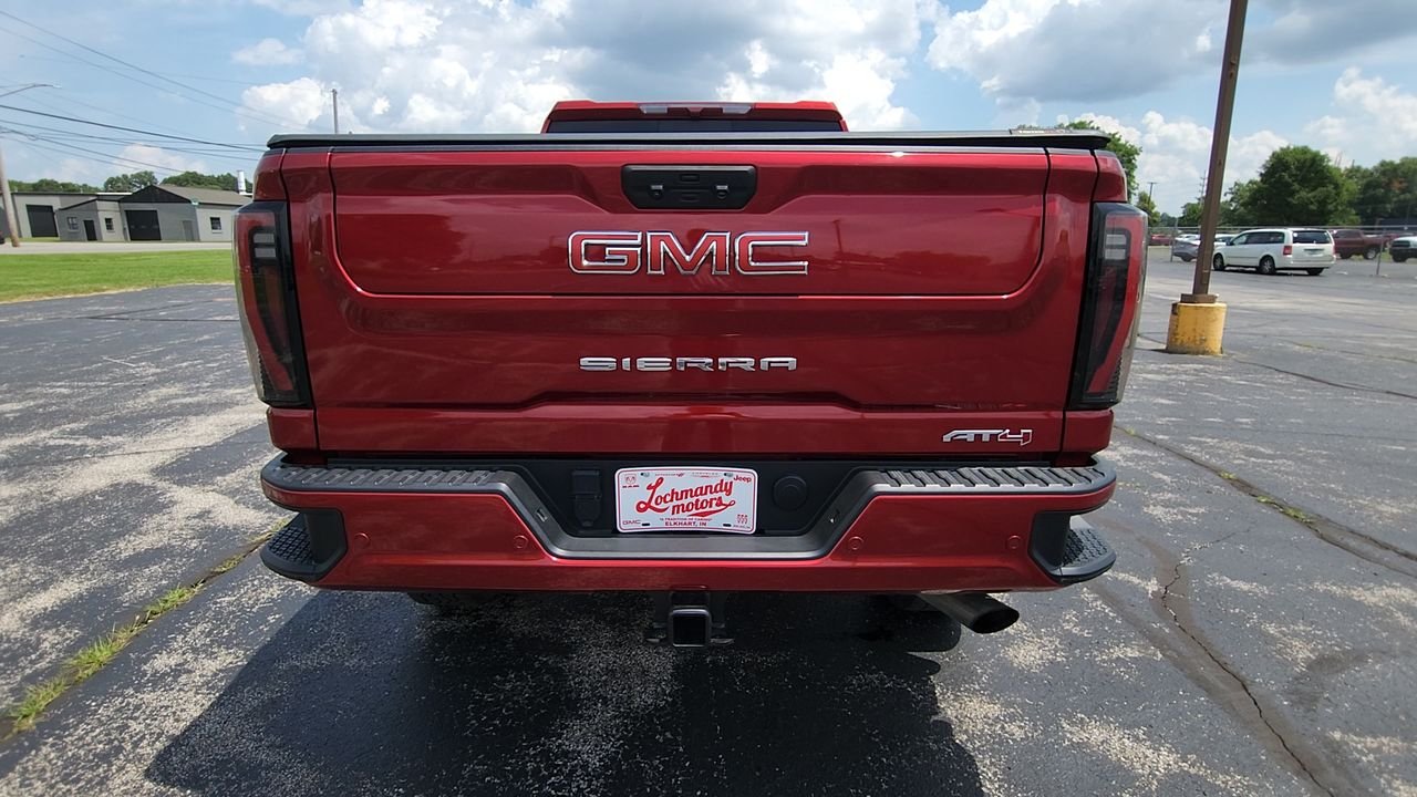 Used 2024 Volcanic Red Tintcoat GMC AT4 image 7