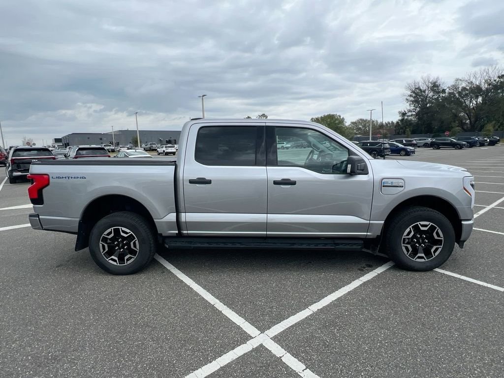 Used 2023 Ford F-150 Lightning XLT with VIN 1FTVW1EL8PWG53969 for sale in Clermont, FL