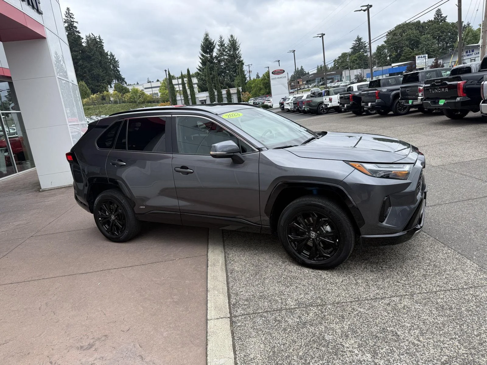 Used 2023 Magnetic Gray Metallic Toyota Hybrid SE image 9