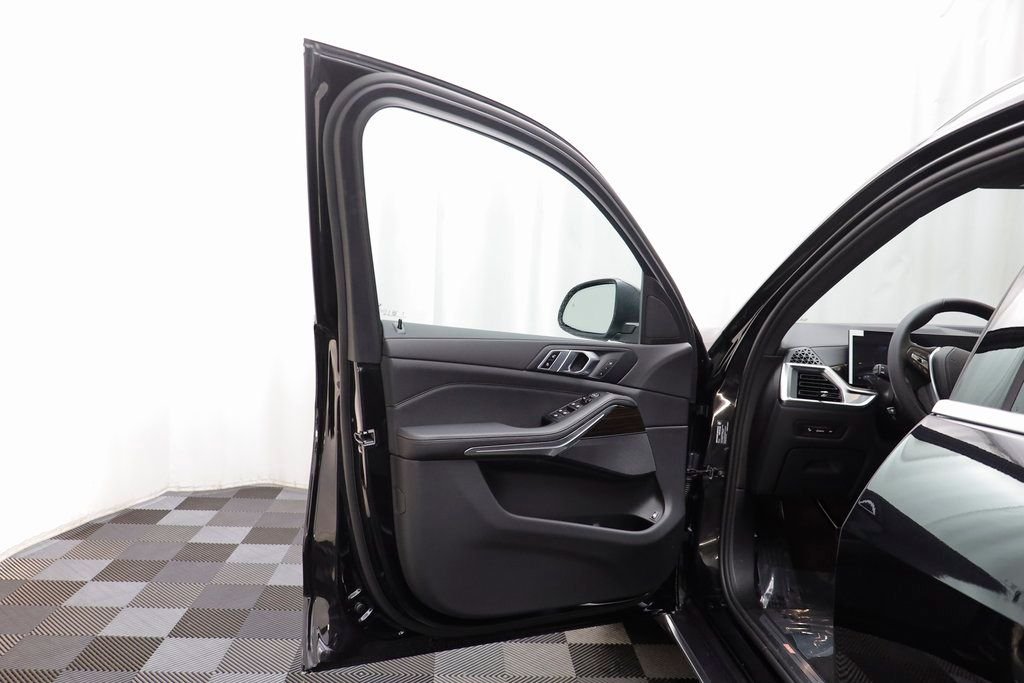 New 2026 Black Sapphire Metallic BMW xDrive50e image 4