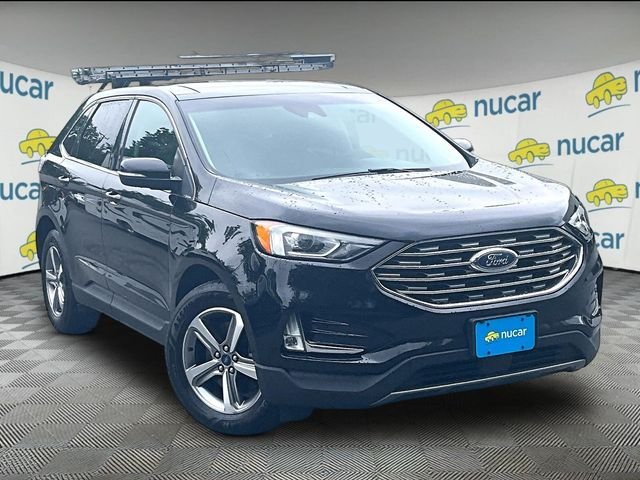 Used 2020 Black Ford SEL image 1