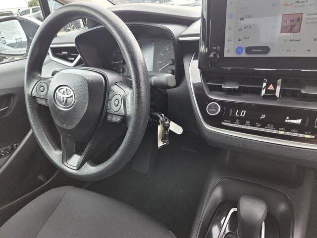 Used 2025 Classic Silver Metallic Toyota LE image 30