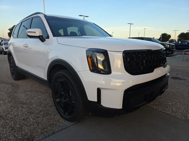 Used 2025 White Kia EX X-Line image 1