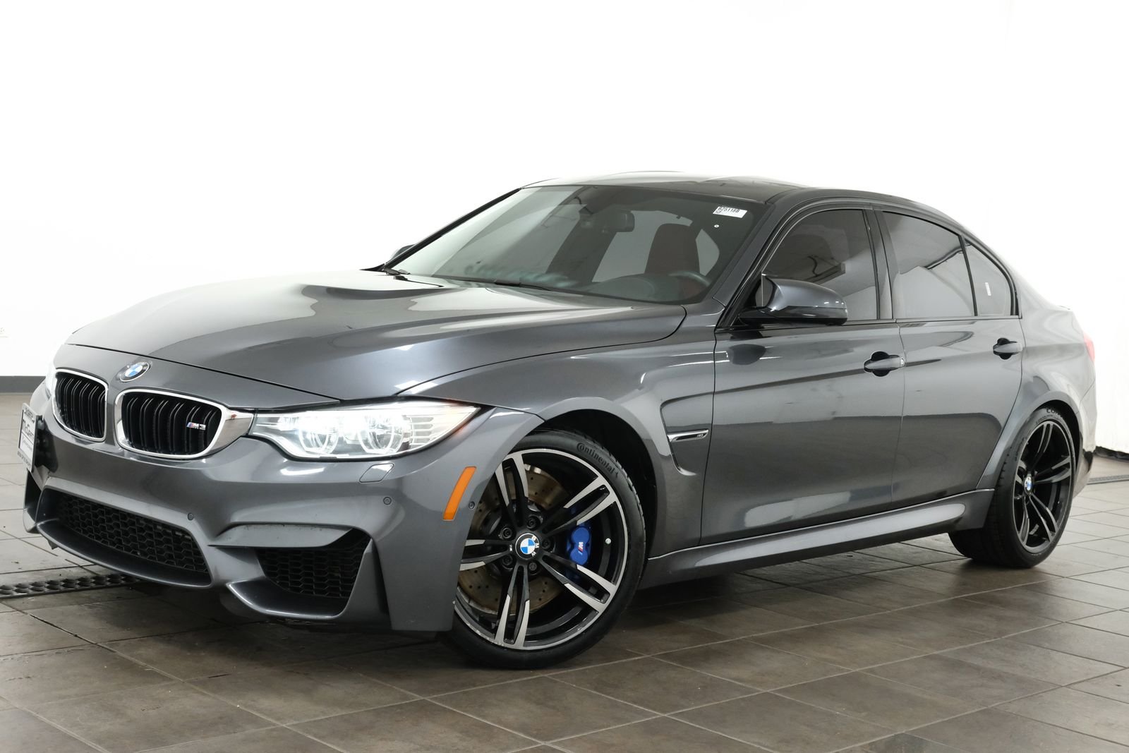 Used 2016 Mineral Gray Metallic BMW Base image 1