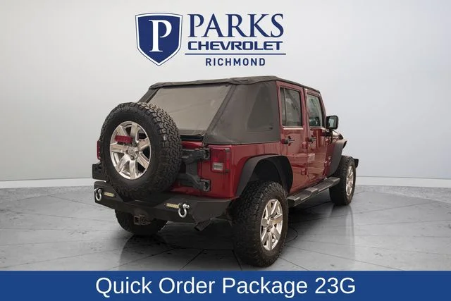 Used 2013 Red Jeep Unlimited Sahara image 8