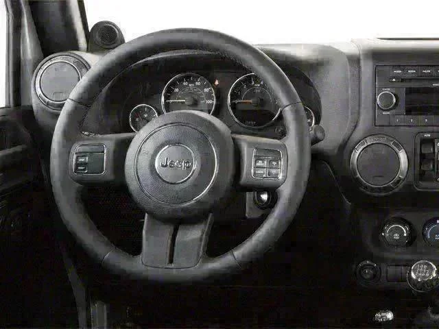 Used 2010 Silver Jeep Unlimited Sahara image 6