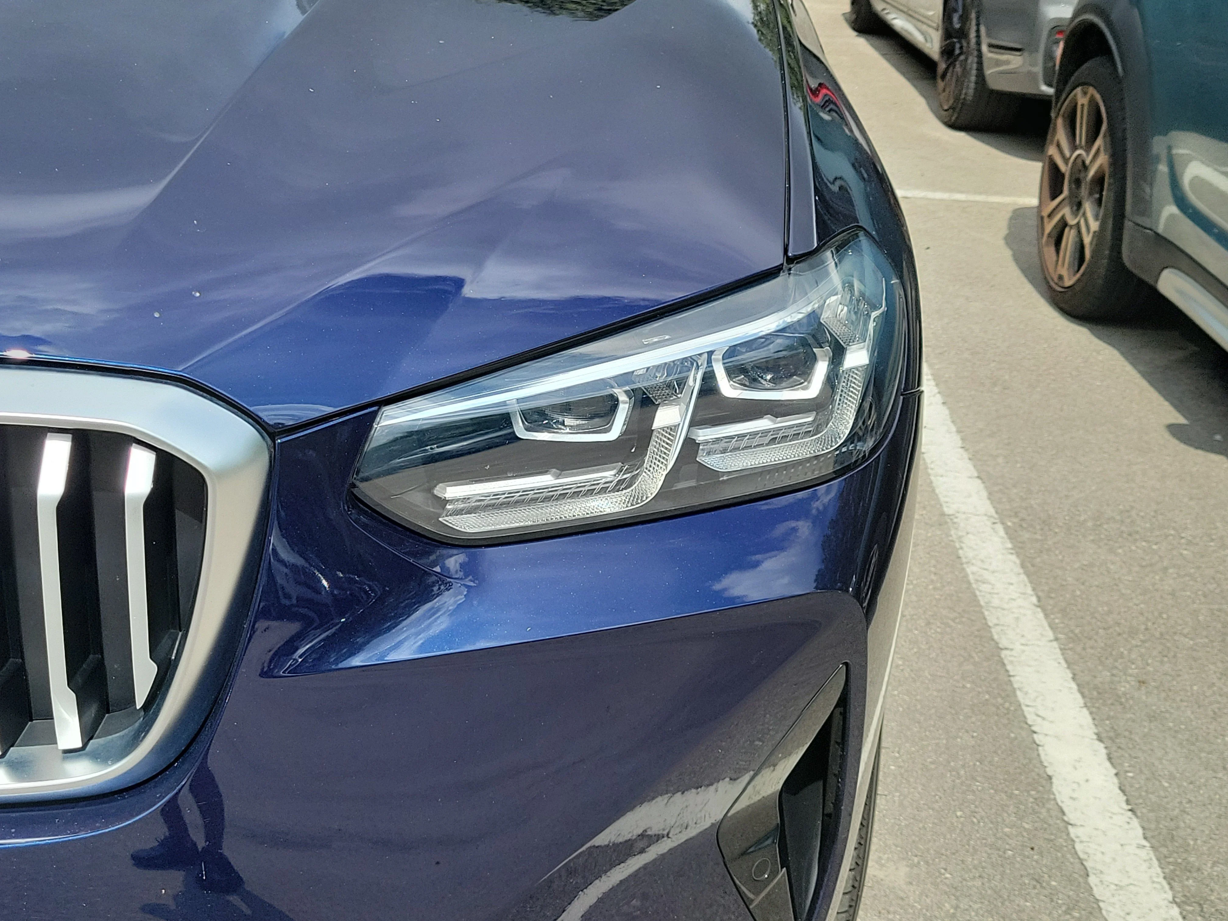 Used 2023 Tanzanite Blue II Metallic BMW sDrive30i image 4
