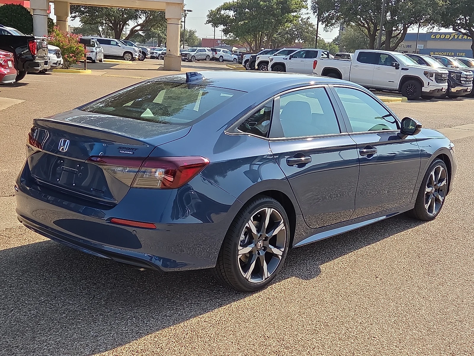 New 2026 Blue Lagoon Pearl Honda 2WD Sport Touring Hybrid image 4