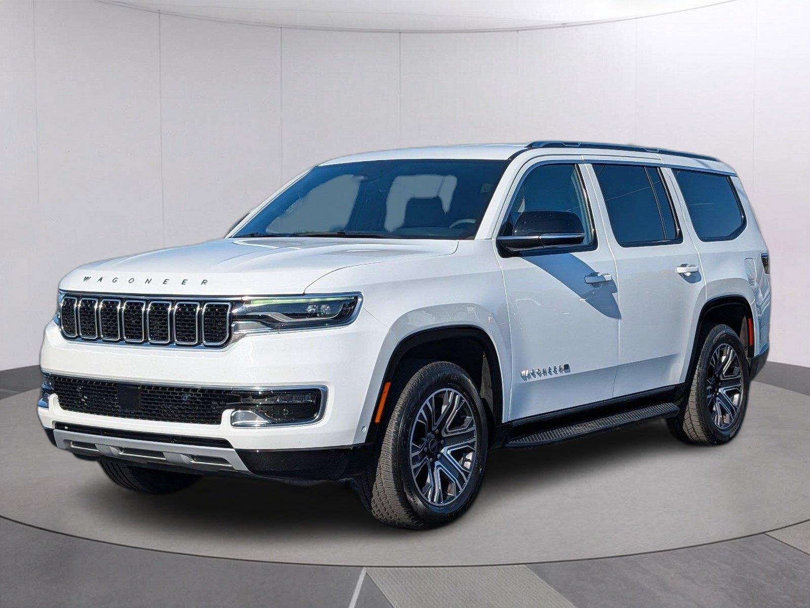 Used 2025 Bright White Clearcoat Jeep Series II image 1