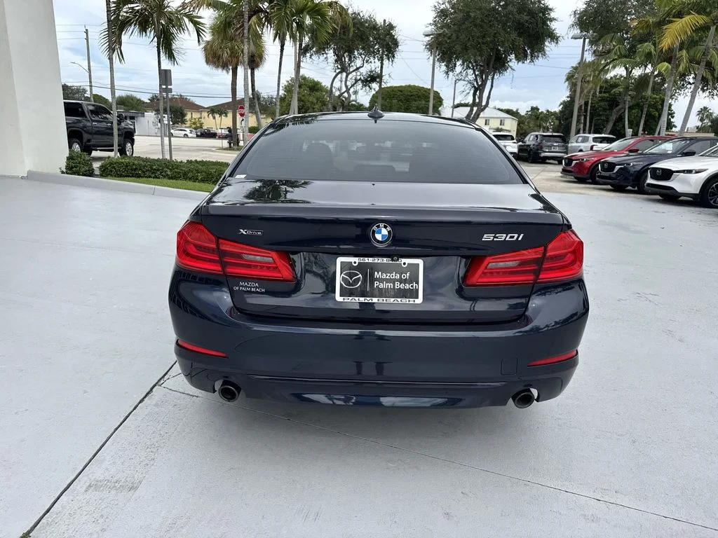 Used 2019 BMW 5 Series 530i with VIN WBAJA7C59KG911243 for sale in North Palm Beach, FL