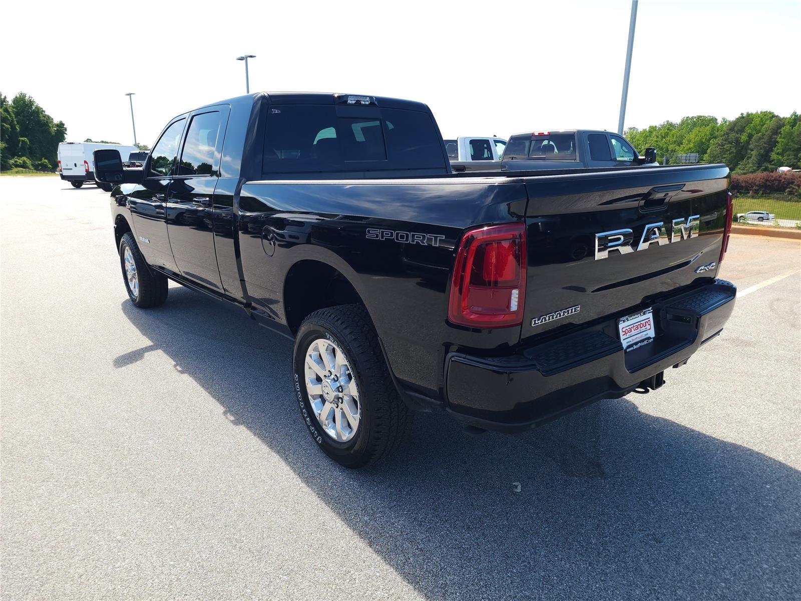 New 2026 Diamond Black Crystal Pearl-Coat Exterior Paint RAM Laramie image 4