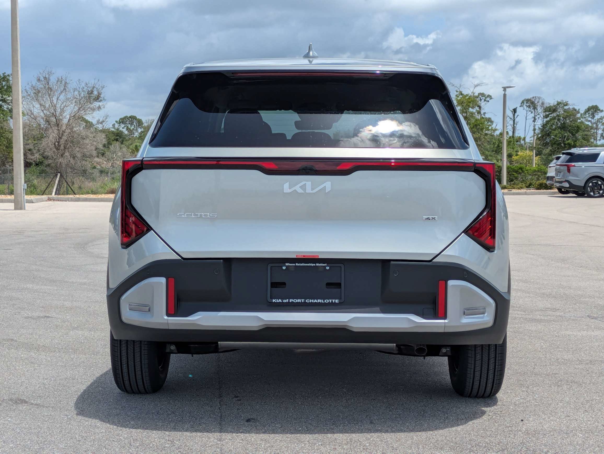 New 2027 Ivory Silver Kia LX image 6