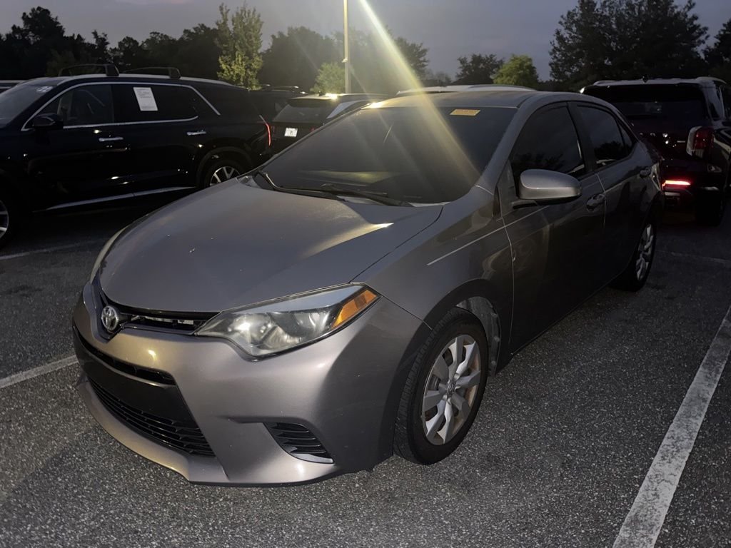 Used 2015 Brown Toyota LE image 1