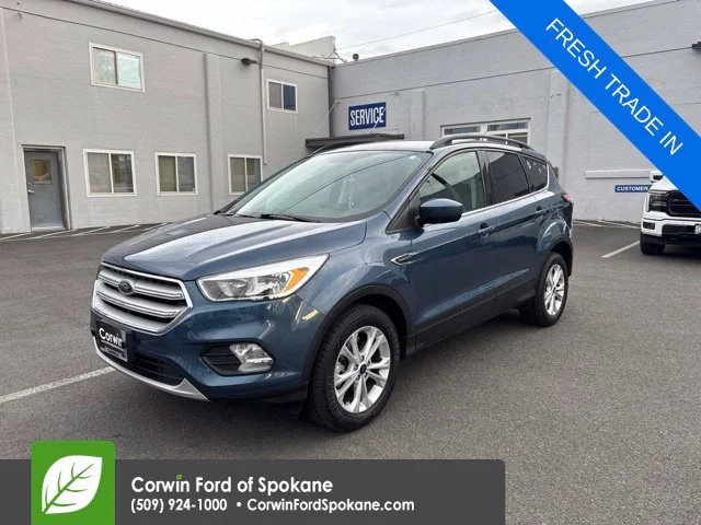 Used 2018 Blue Metallic Ford SE image 1