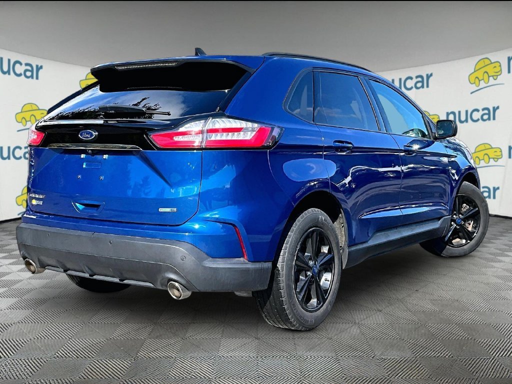 Used 2020 Blue Metallic Ford SE image 6