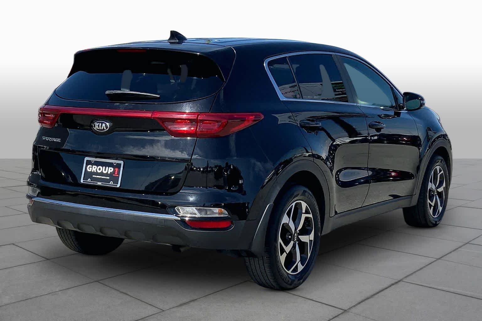 Used 2021 Black Cherry Kia LX image 12