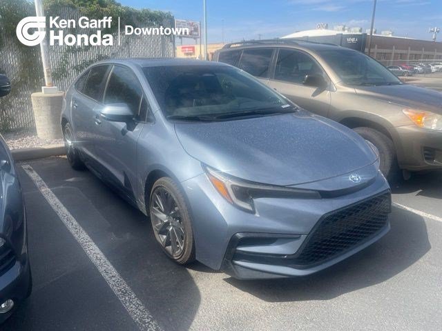 Used 2023 Celestite Toyota Hybrid LE image 1