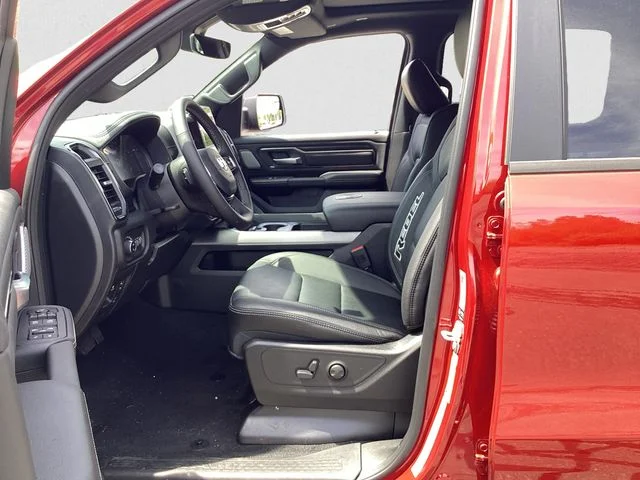 New 2026 Molten Red Ram REBEL CREW CAB 4X4 5