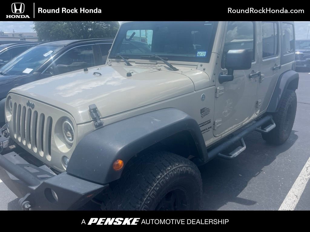 Used 2017 Gobi Clearcoat Jeep Unlimited Sport image 1