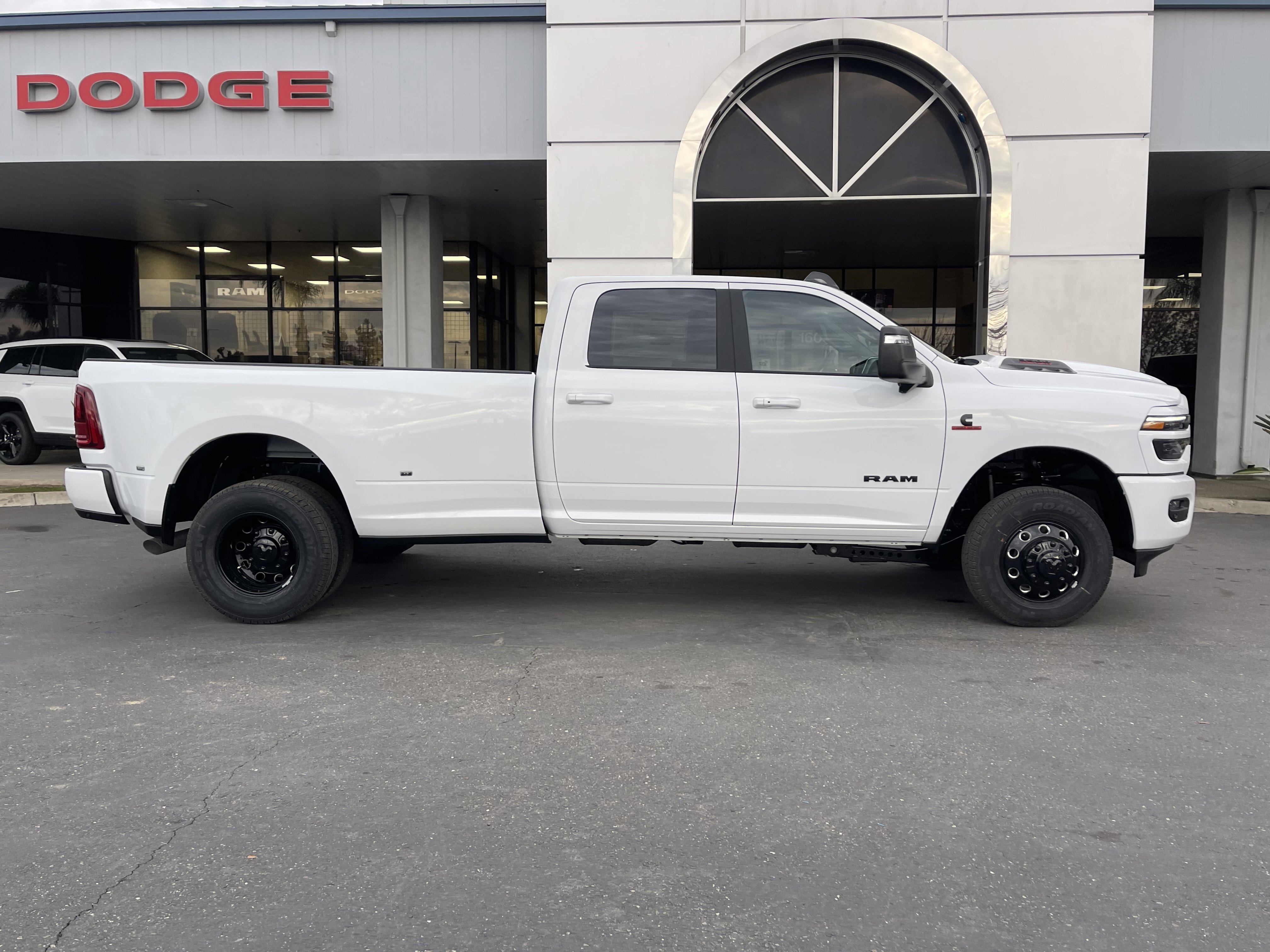 New 2026 Bright White Clear-Coat Exterior Paint RAM Laramie image 9
