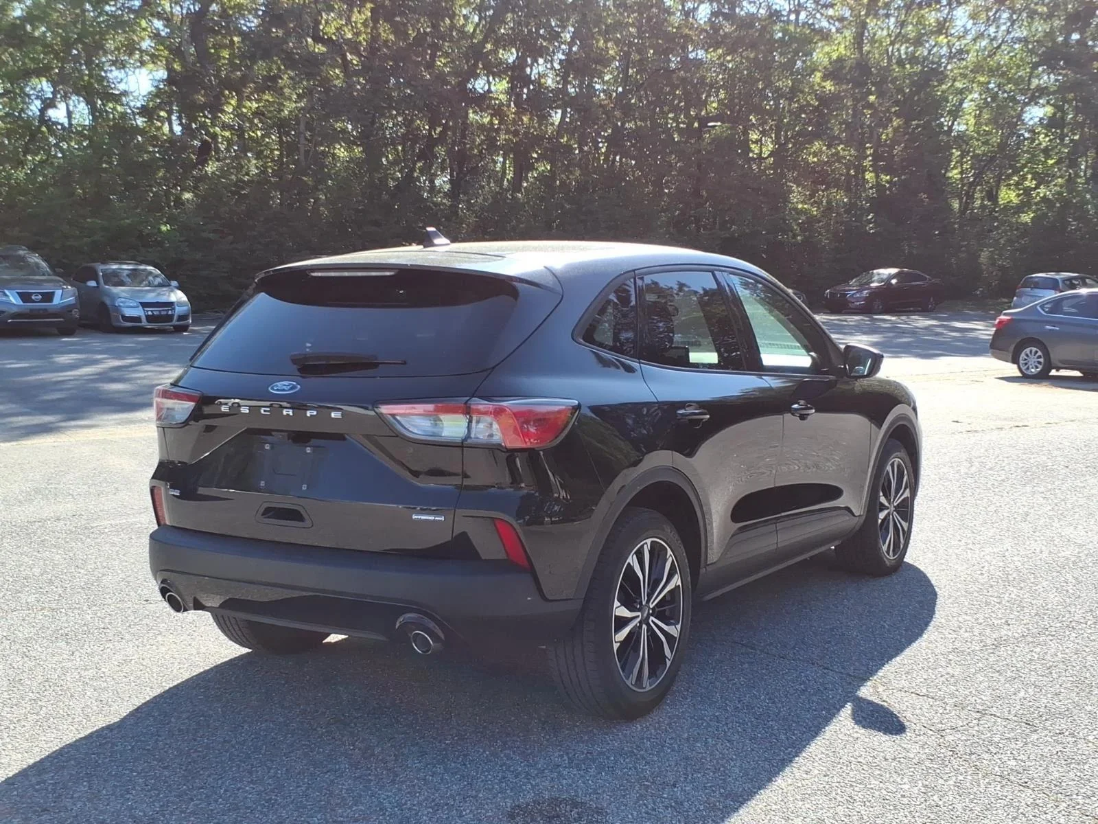Used 2021 Agate Black Metallic Ford SE Hybrid image 7
