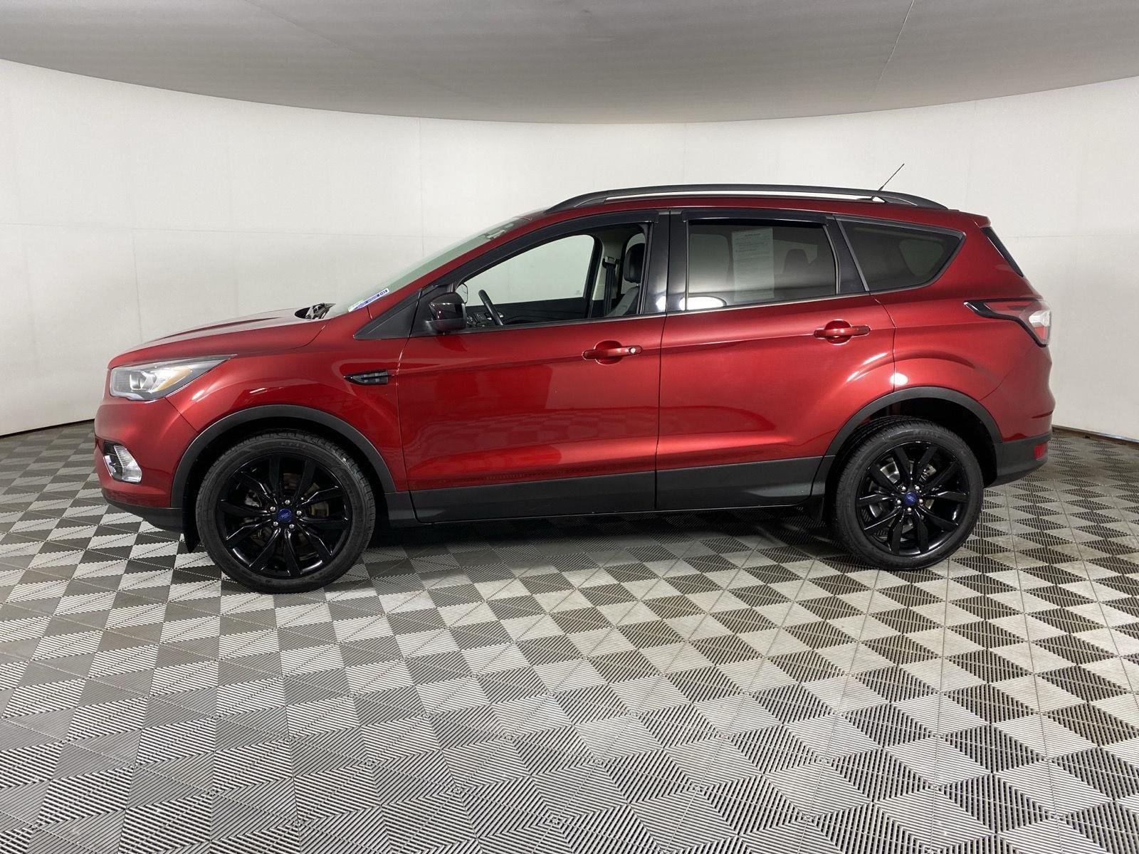 Used 2017 Ruby Red Metallic Tinted Clearcoat Ford SE image 4