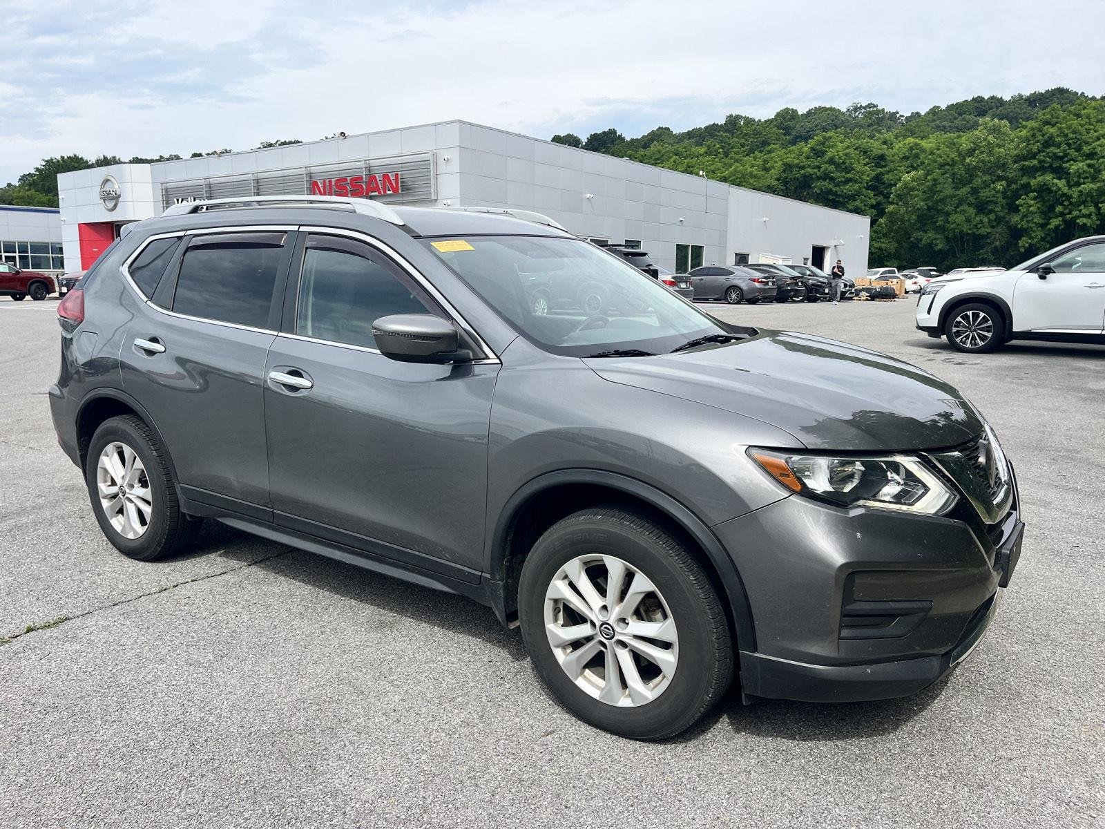 Used 2018 Gun Metallic Nissan S image 1