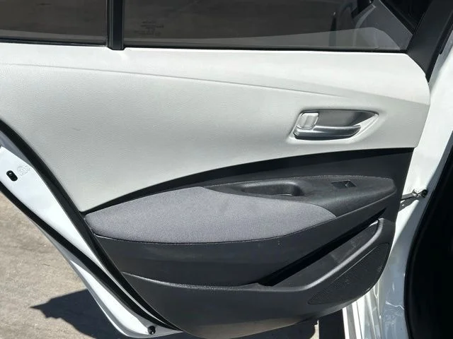 Used 2021 Super White Toyota LE image 13