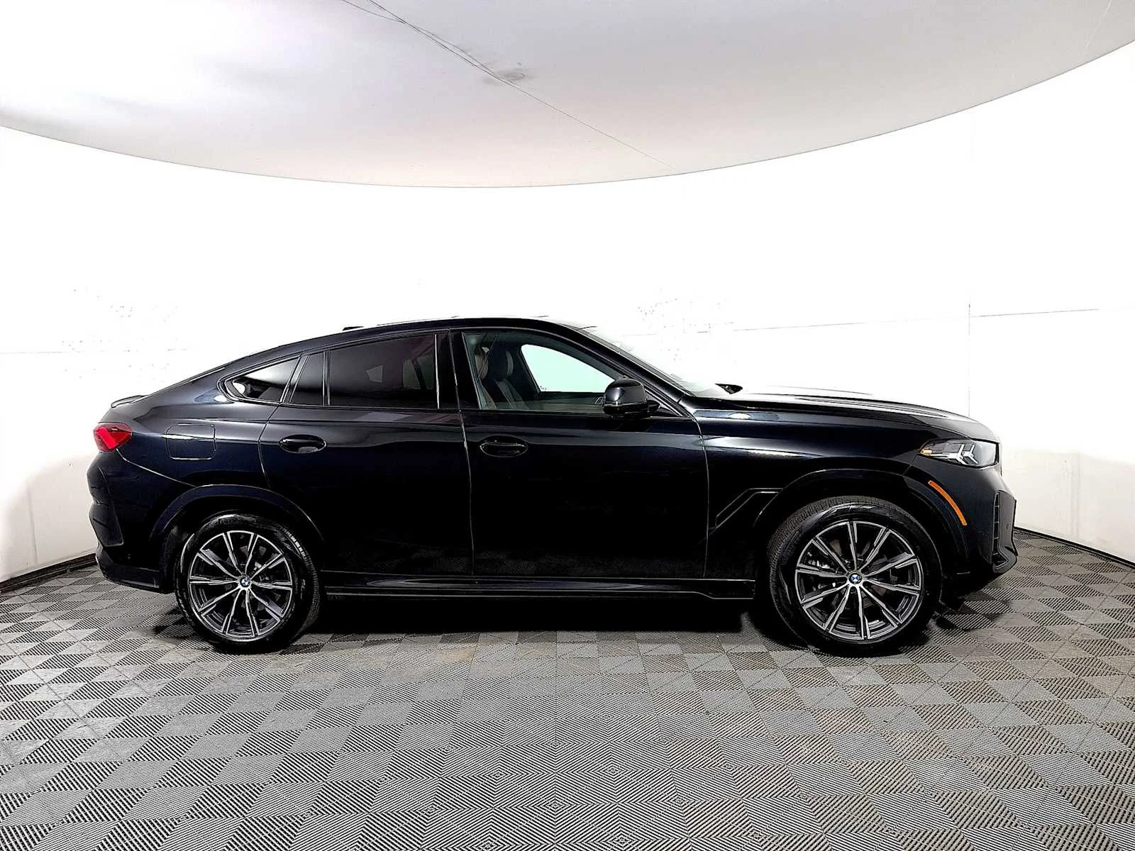 Certified Used 2024 Black Sapphire Metallic BMW xDrive40i image 7