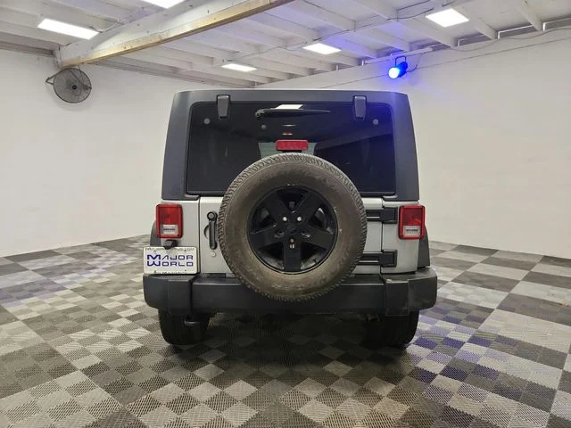 Used 2014 Gray Jeep Unlimited Sport image 6