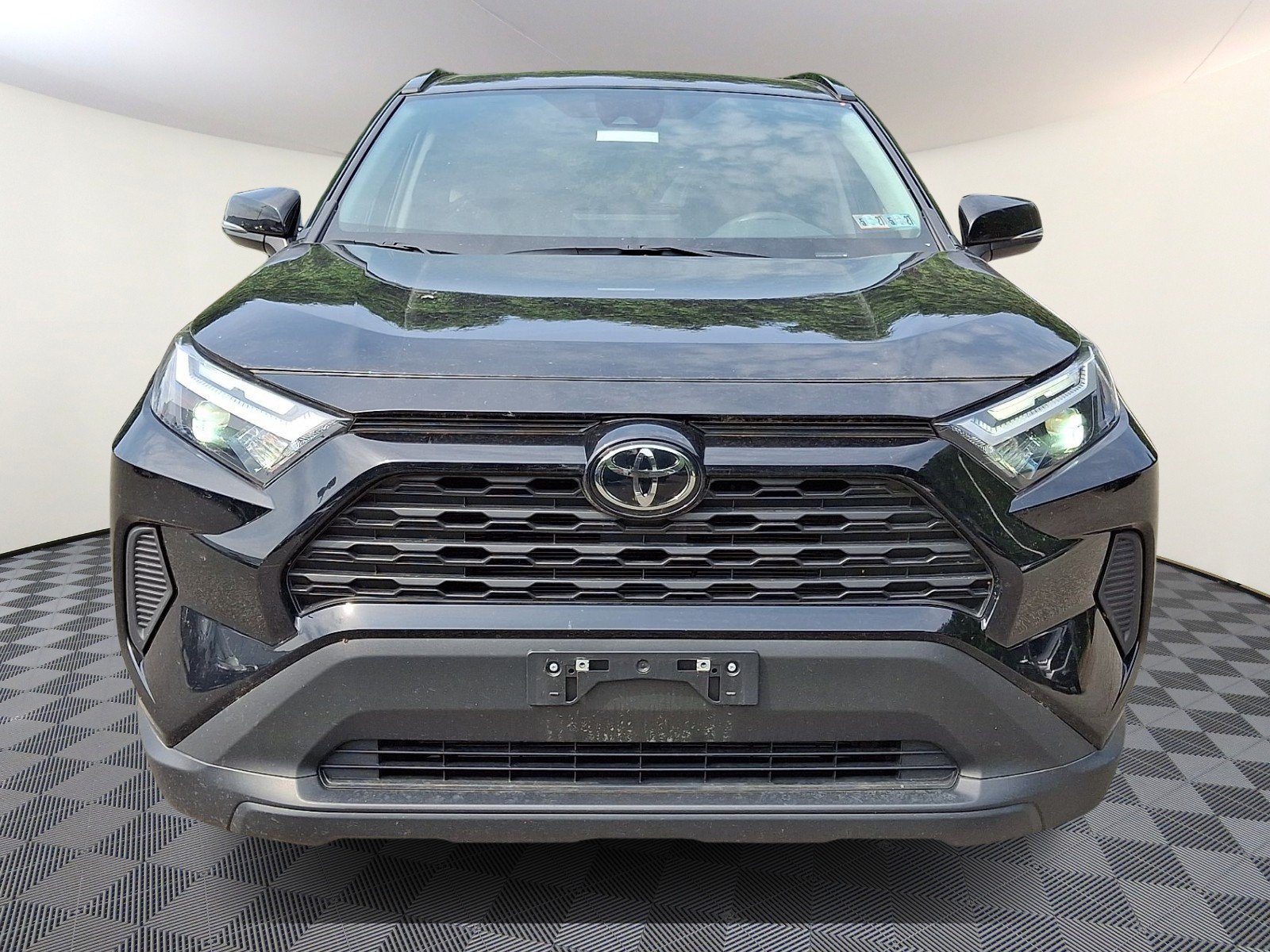 Used 2025 Midnight Black Metallic   218 Toyota Hybrid XLE image 1